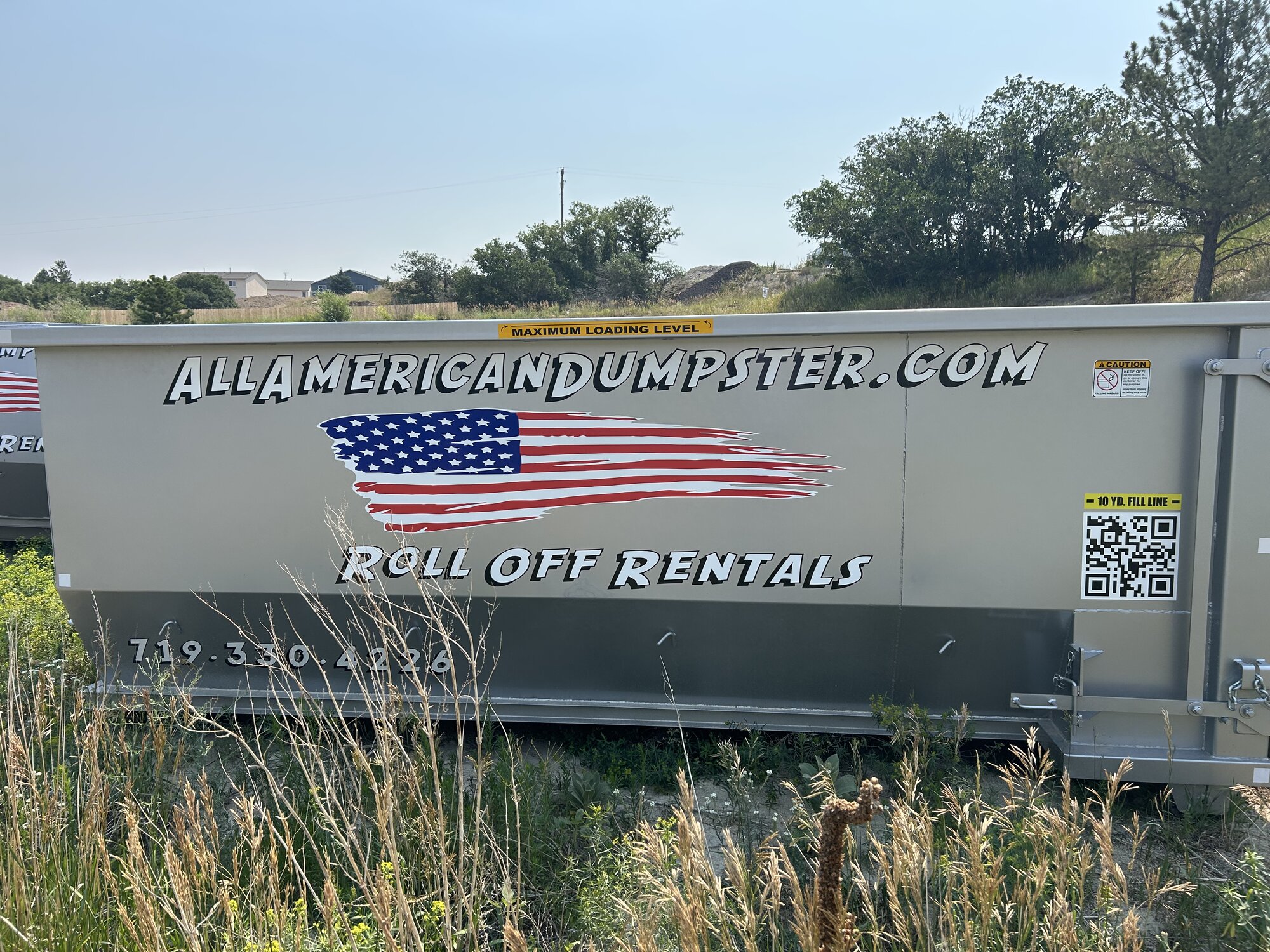 10-yard All American Dumpster with yellow MAXIMUM LOADING LEVEL band